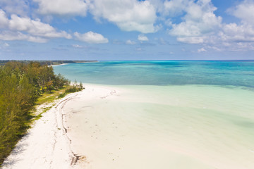 Large tropical island white sandy beach, view from above. Seascape, nature of the Philippine Islands. Tropical forest and sea lagoons.