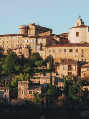 Fototapeta na wymiar Panorama of the city of Gordes in the sunset in Provence in France