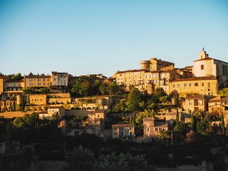 Fototapeta na wymiar Panorama of the city of Gordes in the sunset in Provence in France