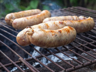 Close up from tasty Sausages on a bbq