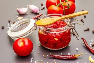 Tomato confiture, jam, chutney, sauce. Homemade preservation concept