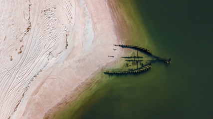 Drone view of a shipwreck called Roanoke Barges in Reeves Beach Riverhead Calverton Long Island New...