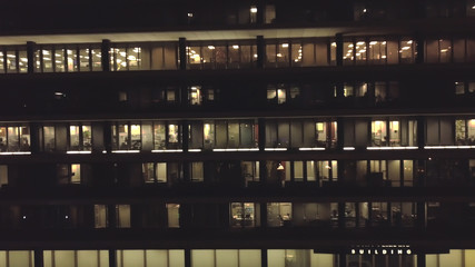 office building at night.Glass curtain wall office building. Window texture