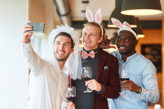 Friends make selfie at bachelor party