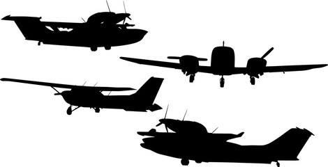 four small airplanes silhouettes isolated on white