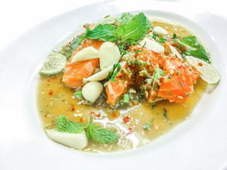 Salmon spicy salad in Thai style