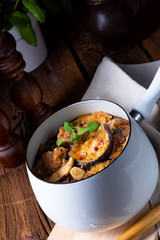 Veal goulash with baked aubergine and herbs