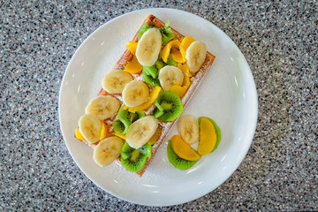 delicious Belgian waffles with fruit and ice cream