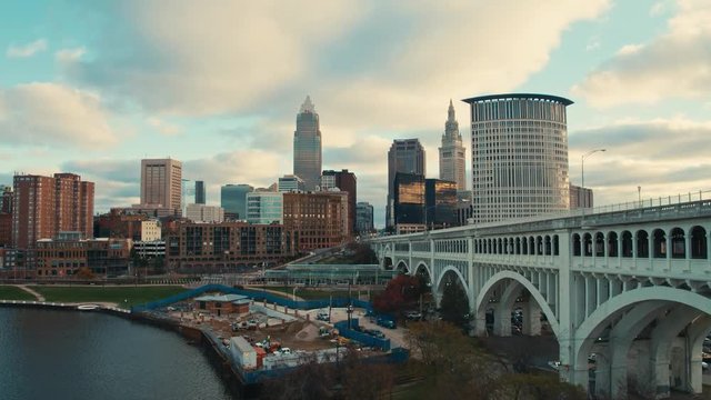 Rising drone shot from above the Cuyahoga River in the Flats to reveal downtown Cleveland Ohio