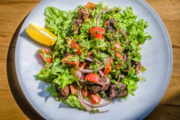 Shish kebab with vegetable salad
