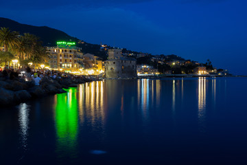 RAPALLO, ITALY JULY, 3, 2019 - View of Rapallo, Genoa (Genova) province and the castle on the sea by night, Italy.