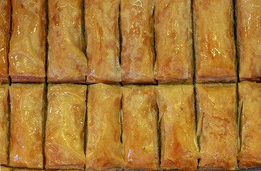 Sweet baklava with honey and nuts for sale at local farmers market