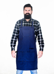 Apron protecting his clothing from splatters. Master cook in cooking apron with pockets. Bearded man cook in kitchen apron. Grill cook isolated on white. Cook with long beard wearing bib apron