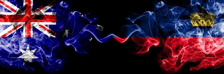 Australia vs Liechtenstein, Liechtensteins smoky mystic flags placed side by side. Thick colored silky smokes combination of national flags of Australia and Liechtenstein, Liechtensteins