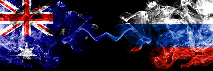 Australia vs Russia, Russian smoky mystic flags placed side by side. Thick colored silky smokes combination of national flags of Australia and Russia, Russian