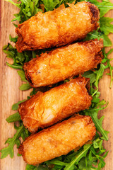 pork spring rolls Rice cakes stuffed with a pork stuffing accompanied by sauce