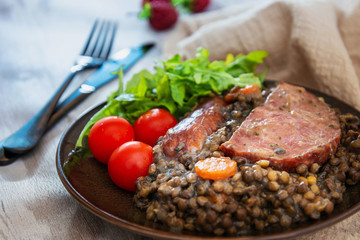 Green lentils with smoked pork sausage smoked choice, carrots and onions