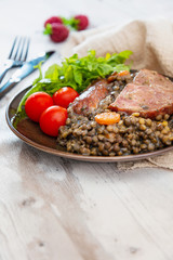 Green lentils with smoked pork sausage smoked choice, carrots and onions