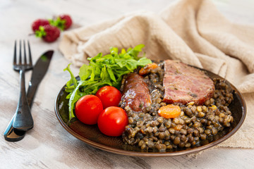 Green lentils with smoked pork sausage smoked choice, carrots and onions