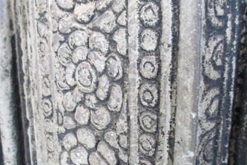 Stone wall carving Cambodia bas-relief flowers Angkor Wat