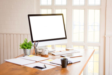 Office desks in the office and computers white screen with office equipment