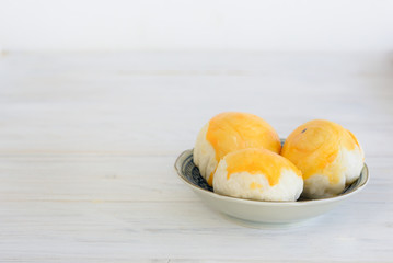 Moon Cakes On Wooden Table.