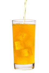 pouring fresh drink yellow soda with ice cubes in glass isolated on white background, concept of refreshing summer drink