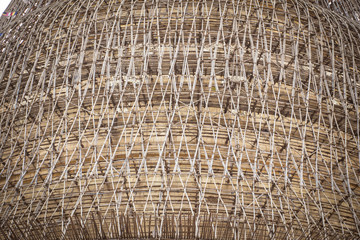 bamboo scaffolding around a temple
