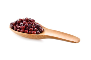 Red bean seeds In wooden spoon on white background