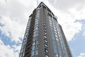 Modern apartment buildings on a sunny day. Facade of a modern apartment building