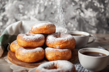 Donuts sprinkled with powdered sugar