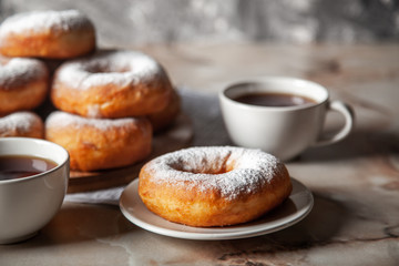 Donuts sprinkled with powdered sugar