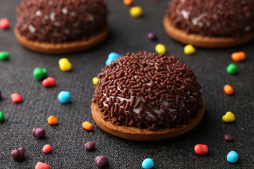 Chocolate Crinkle cookies. close-up of Crinkle cookies chocolate biscuits on Christmas cookies on a black plate, view from above.
