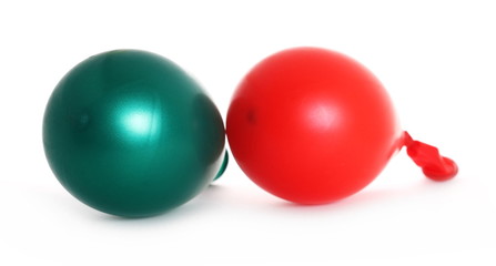 Green and red balloons isolated on white background