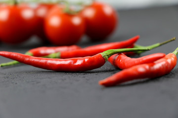 Chilli pepper on black background. Red pepper