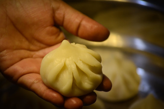 Modak In Hand Of Lady