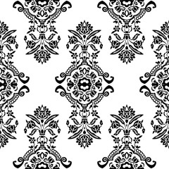 Woodblock printed monochrome seamless ethnic floral all over pattern. Traditional oriental ornament of India with exotic flowers of Kashmir, black on white background. Textile design. - 277686963