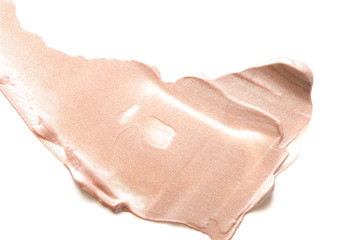 Beige smears of crushed highlighter or luminizer. - Image