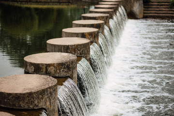 artificial city waterfall with water splashes