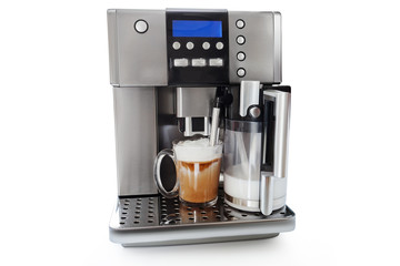 automatic coffee maker with cup of coffee and milk jug
