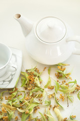 Brew tea with dried linden blossom in natural environment