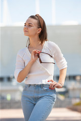 Young and beautiful woman walking in the park.