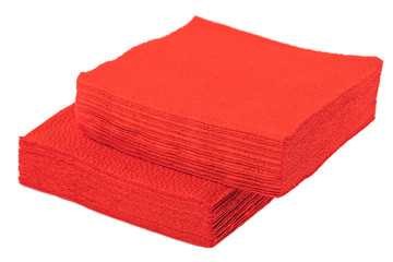stack of clean red paper napkins on a white background.