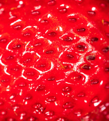 Red ripe strawberry as a background