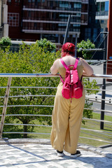 Woman in pink and yellow