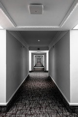 Moody looking hotel corridor. Perspective tunnel