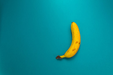 Banana on blue background.