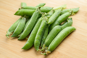 Natural looking fresh green pea. Macro with shallow depth of field.