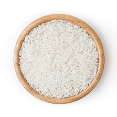 White rice in wooden bowl isolated on white background with clipping path