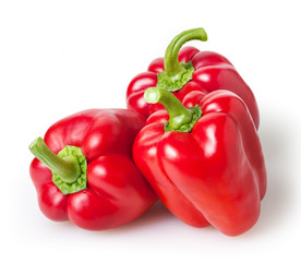 Red bell peppers isolated on white background with clipping path